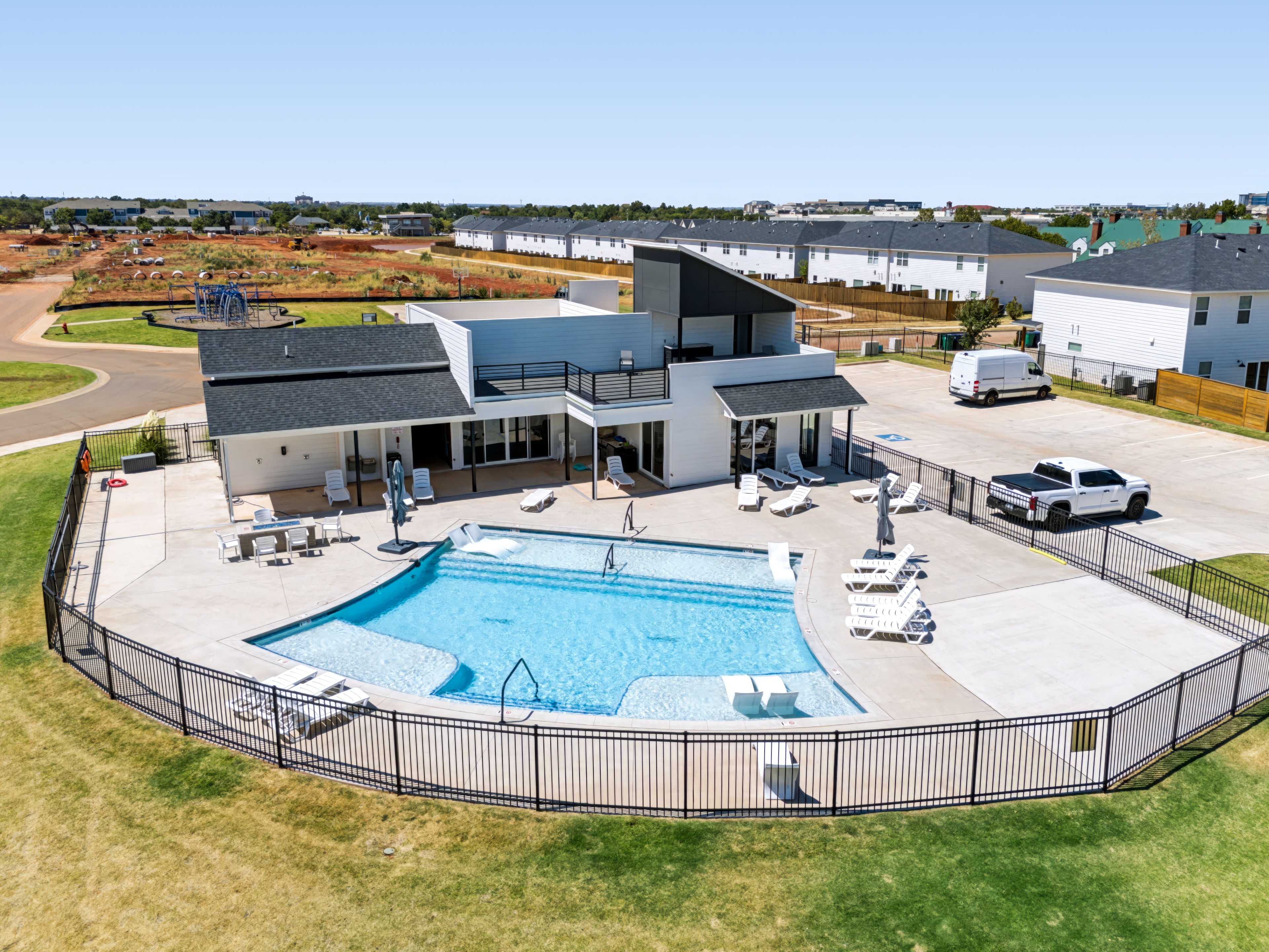 Aerial view of community pool and clubhouse